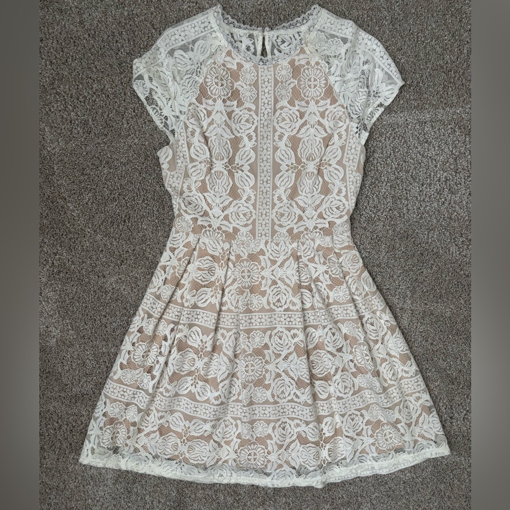 White lace skater dress.  Perfect for graduation, rehearsal dinner…